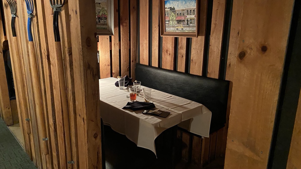 A cozy booth inside The Farmhouse